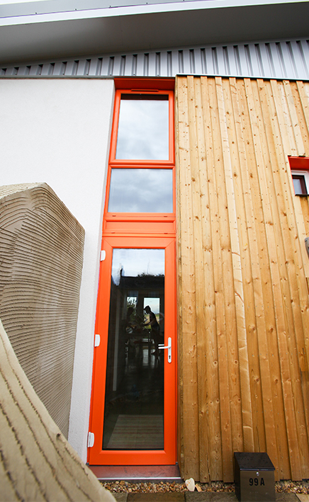 Bright orange uPVC windows and glazed residential door