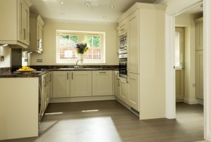 Internal view of cream casement windows in a fitted kitchen