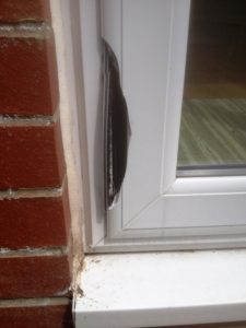 Broken edge of ModLok patio door where burglars attempted to make entry into a home in Halifax 