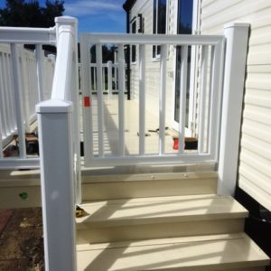 Liniar uPVC gate installed to provide access to a deck on a caravan