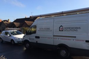White van with Homeworks Solutions branding