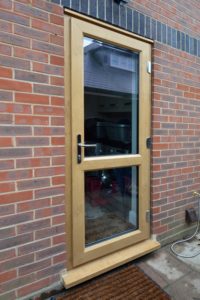 Foiled entry door featuring two glazed panels