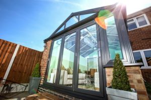 Stunning conservatory featuring the ModLok bi-fold installed by Eco