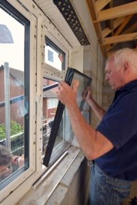 Crystal Home Improvements glazing an EP90 Windows at a property on Gubbins lane.
