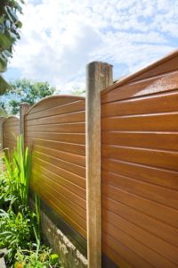 uPVC fencing with woodgrain foil replaces timber in a garden transformation