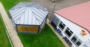 Aerial image of the 'sin bin' at Peterborough RUFC with its new glazed Liniar roof 