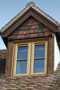 attic window with Irish oak foiled windows by Abbey Windows